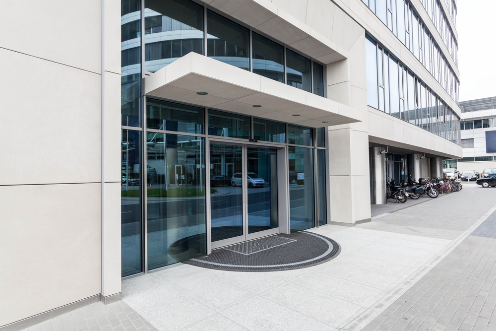Integrated security planning for cameras, access control, gates, alarms, and governance for commercial sites
